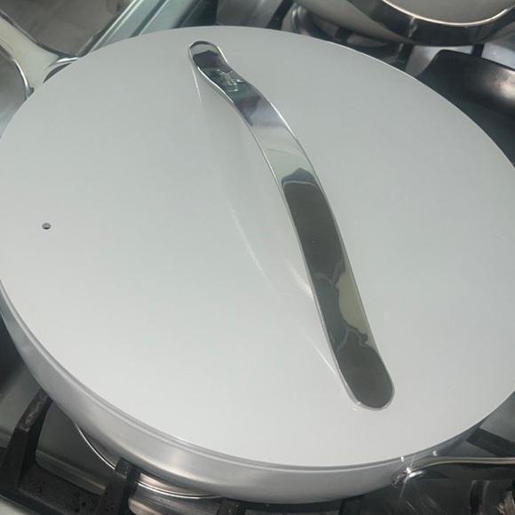 Sleek White Cookware with Silver Handle - Picture 1 of 5